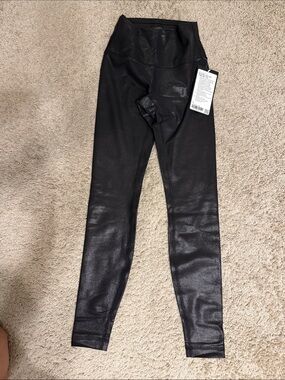 lululemon Wunder Train HR Tight 28” Foil size 4 (black). NWT. SOLD OUT